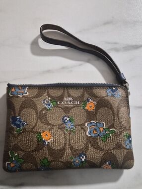 Coach Brown Signature Wristlet with Blue & Orange Floral Accents